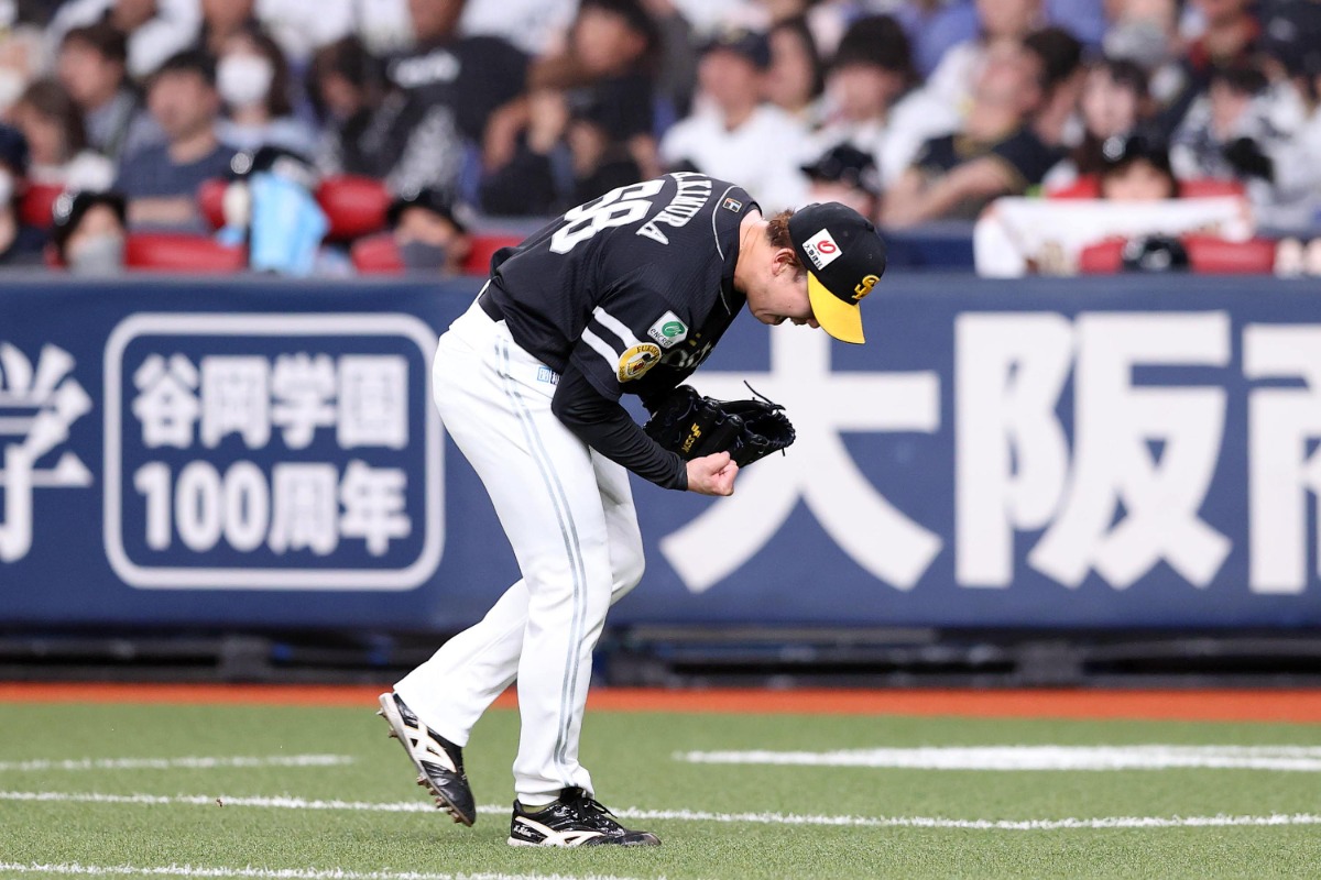 ピンチを切り抜けガッツポーズを見せる木村光【写真：栗木一考】