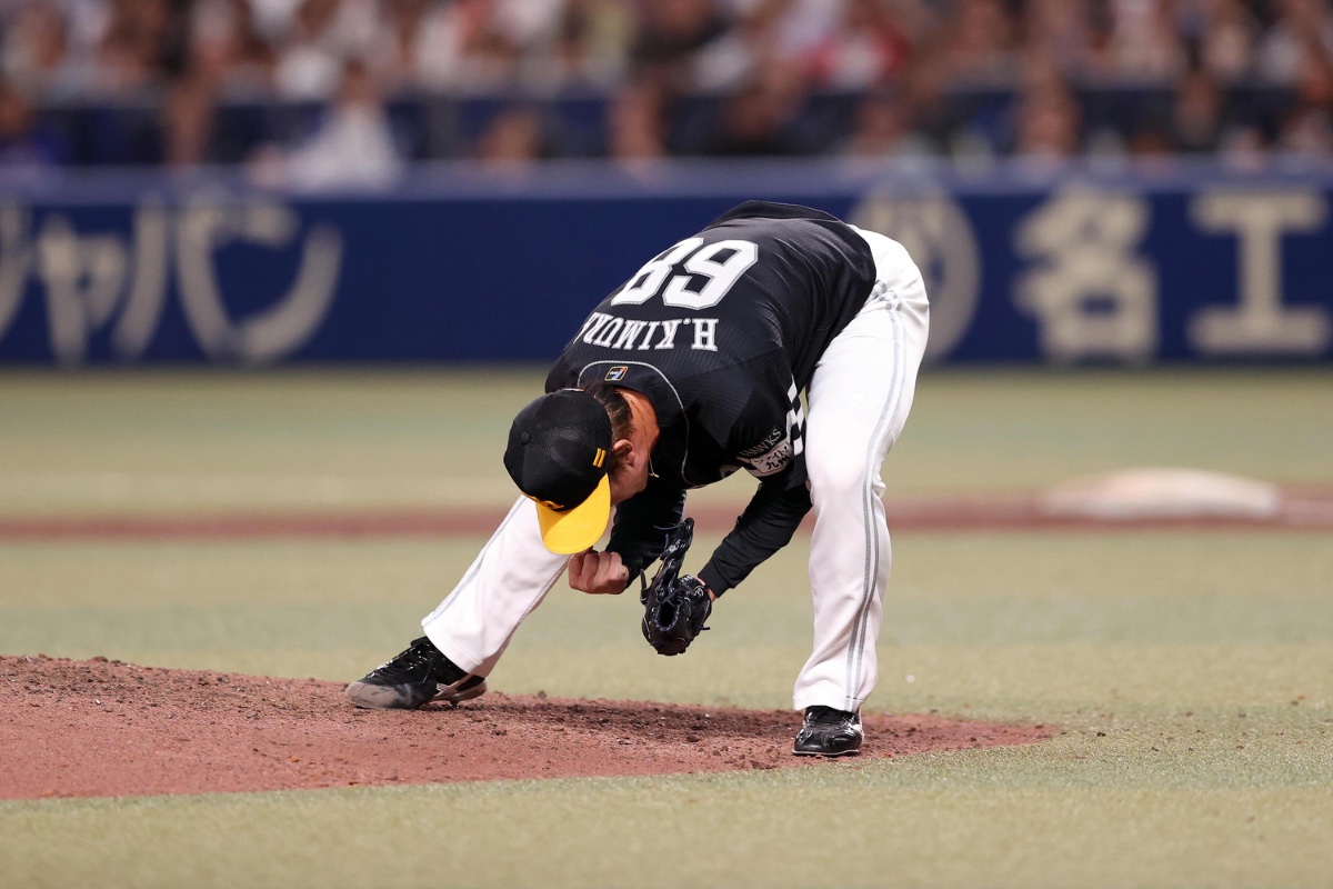 ピンチを切り抜け雄叫びをあげる木村光【写真：栗木一考】