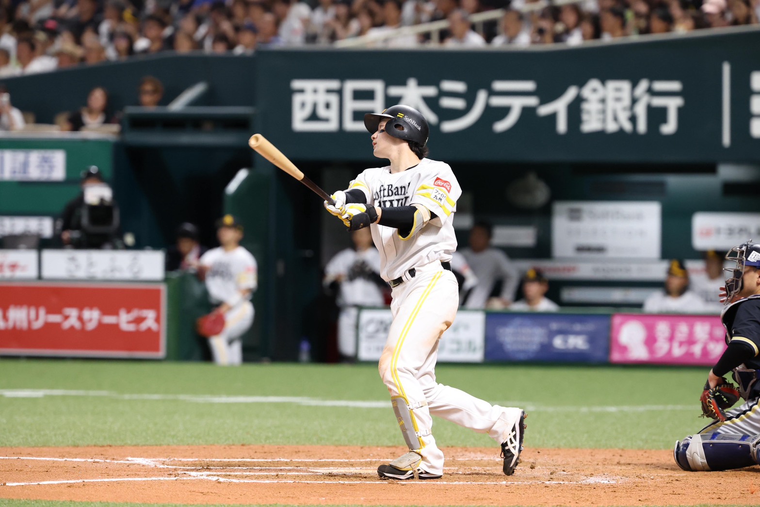 7回裏、2ランを放つ正木智也